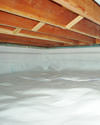 a moisture barrier installed on the walls and floors of a crawl space in Daly City