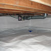 A heating duct extends along this sealed crawl space in Salinas.