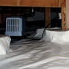 An energy efficient crawl space dehumidifier installed in a sealed crawl space in Daly City.
