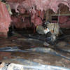 Fiberglass insulation dripping off some heating ducts in a wet crawl space in Petaluma.