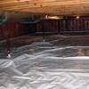 A sealed crawl space with support posts showing in Fremont.