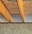 SilverGlo insulation installed in a floor joist in Santa Rosa