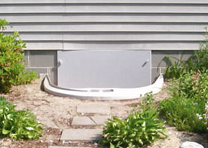 Rigid plastic crawl space access well installed in a Richmond crawl space