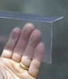 Closeup of a clear plastic covering on a San Francisco crawl space block wall